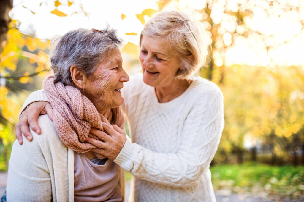 Dominion of Florence | Senior woman and her daughter walking outside