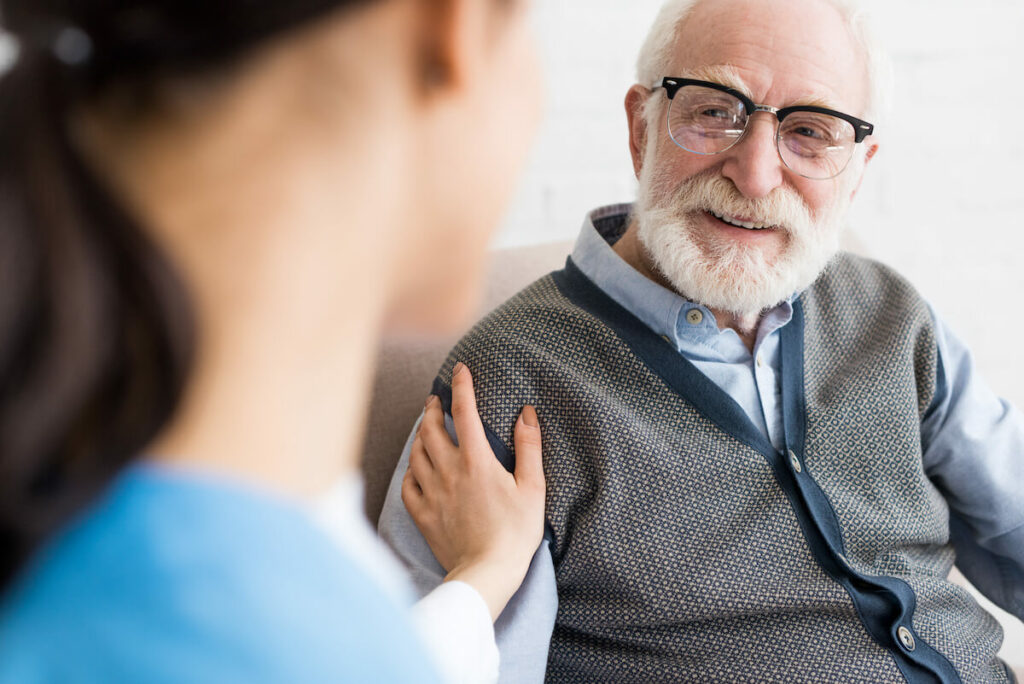 Dominion of Frankfort | Senior man talking with his caregiver