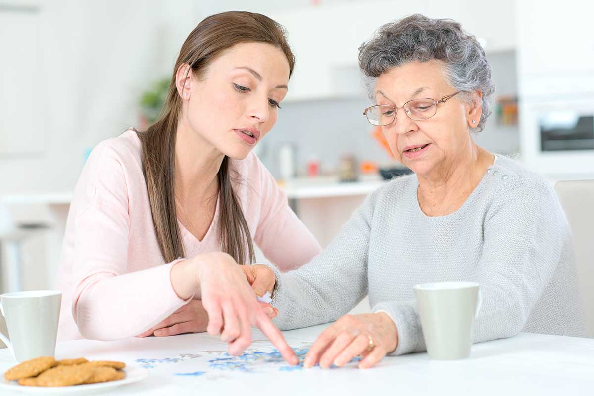 Dominion of Johnson City | Senior woman and her daughter doing a jigsaw puzzle