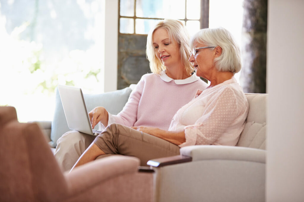 Clover Hill Senior Living | Senior woman and her daughter looking at a computer together