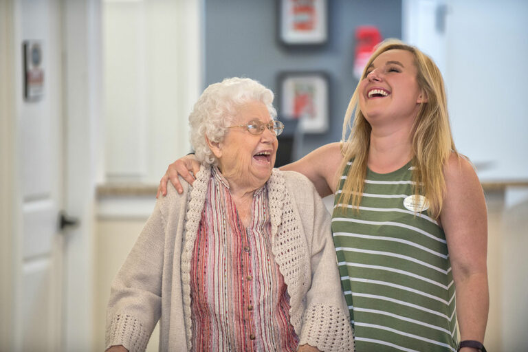 Dominion Senior Living | Happy resident with associate