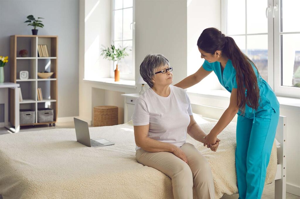 Dominion of Richmond | Female home care nurse supports and assists senior woman with all her daily needs.